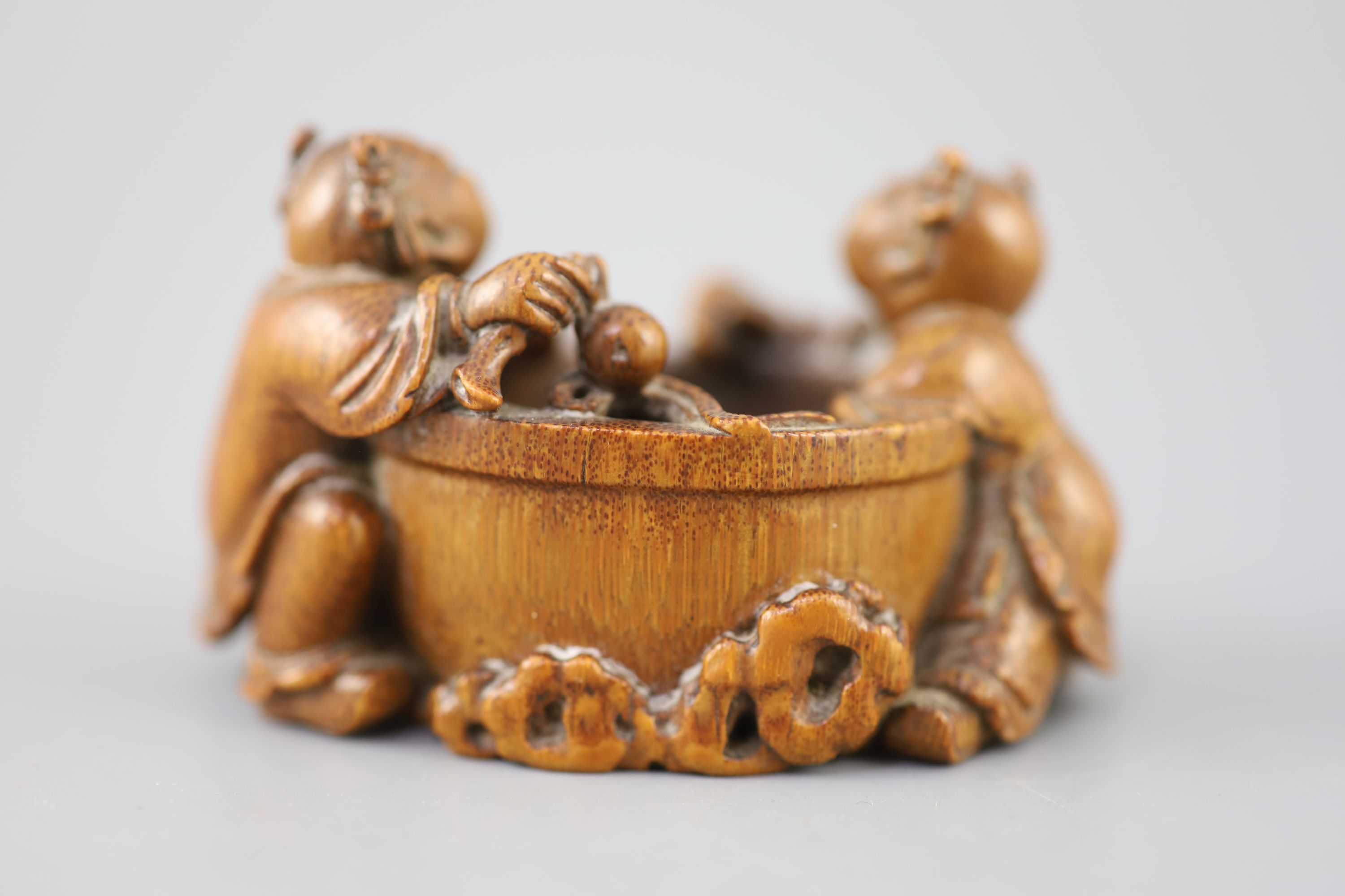 A fine and rare Chinese bamboo-root boys and fish bowl brush washer, 18th/19th century,